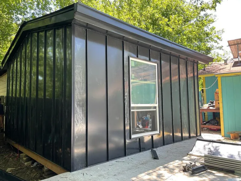 Black standing seam metal wall panels for Metal Roof Installation in Pine Bluff