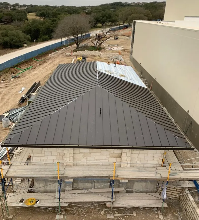 Metal roof new construction with scaffolding in Pine Bluff